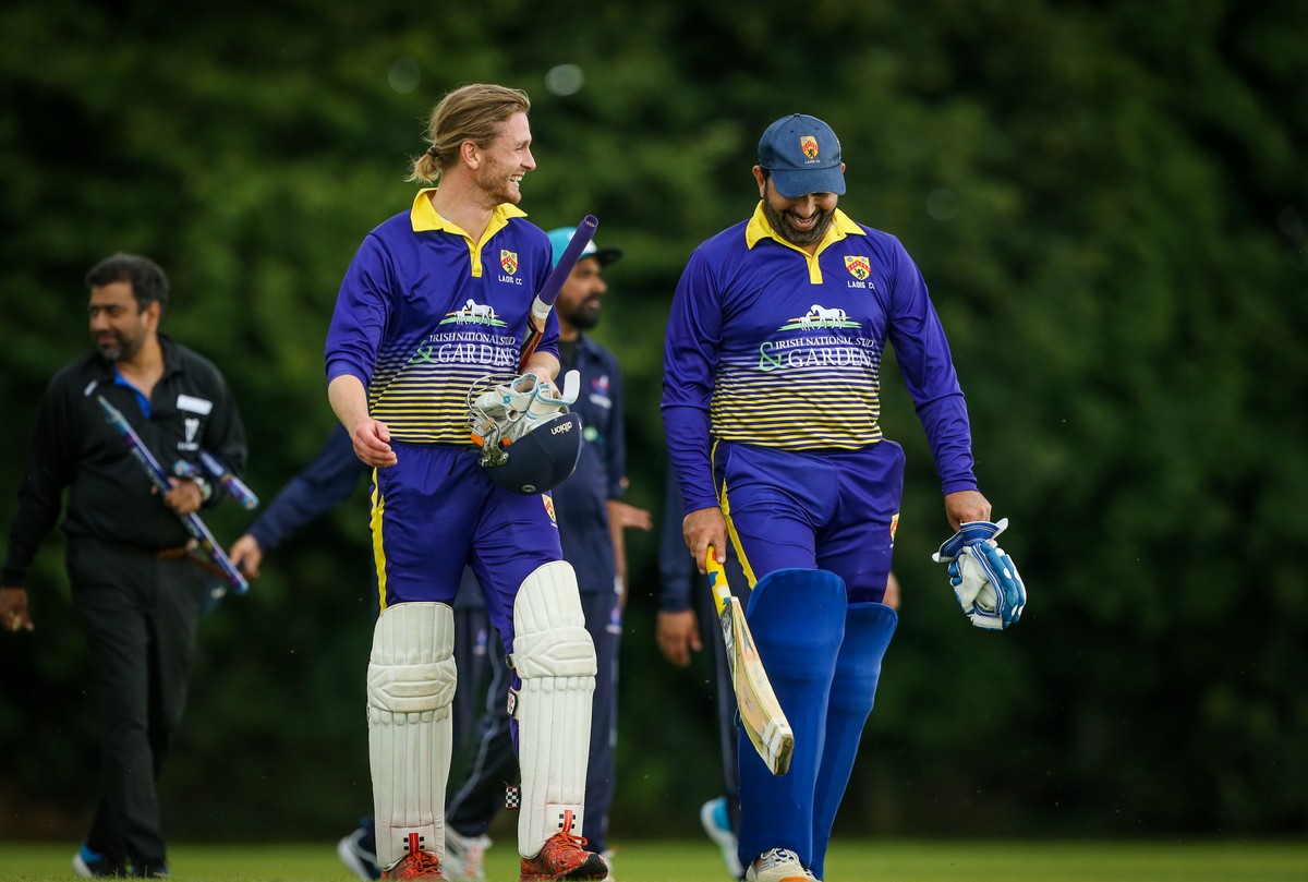 Opening batsmen heading out to the crease on matchday